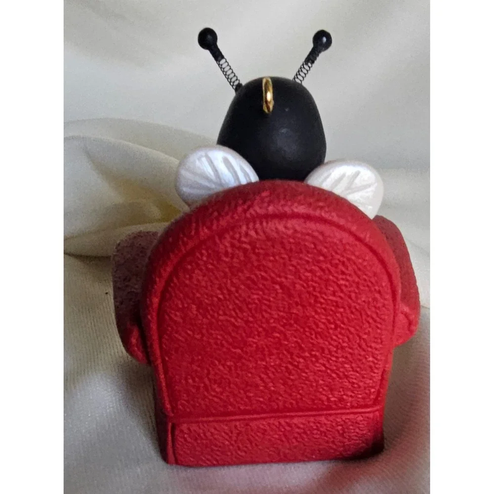 Hallmark Keepsake 1996 Nina Aube Bumble Bee Quilting in Red Chair Ornament